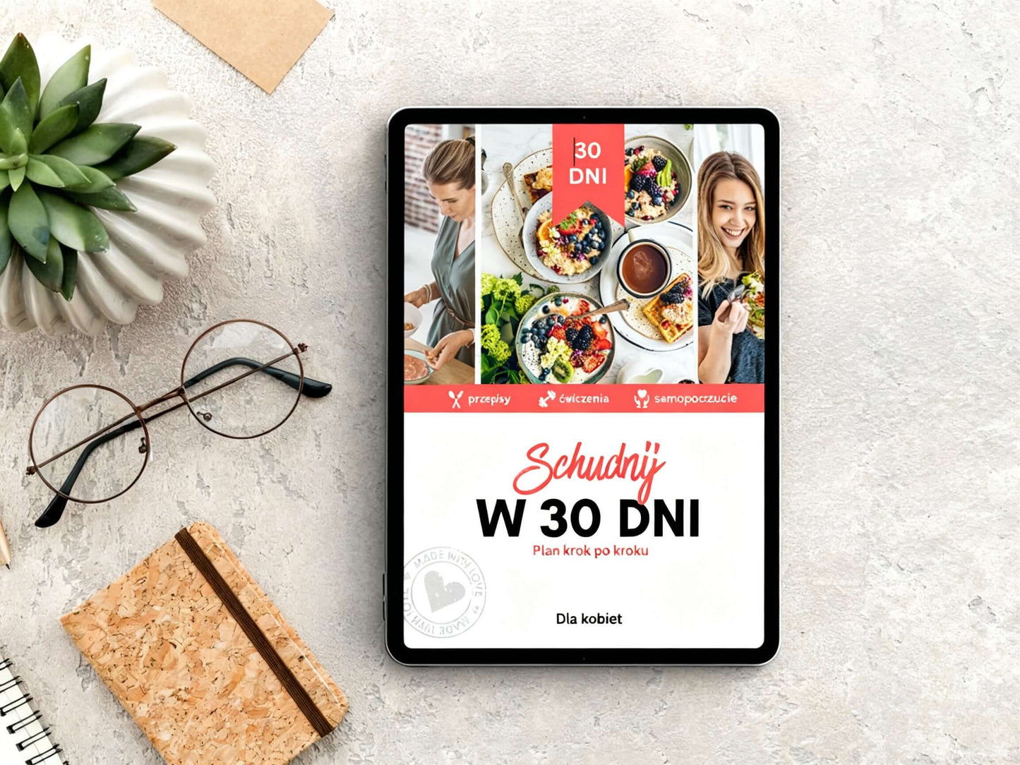 Schudnij w 30 Dni – Dla Kobiet, realny progres -eBook z planem dietetycznym na tablet, zielona roślina i okulary obok.